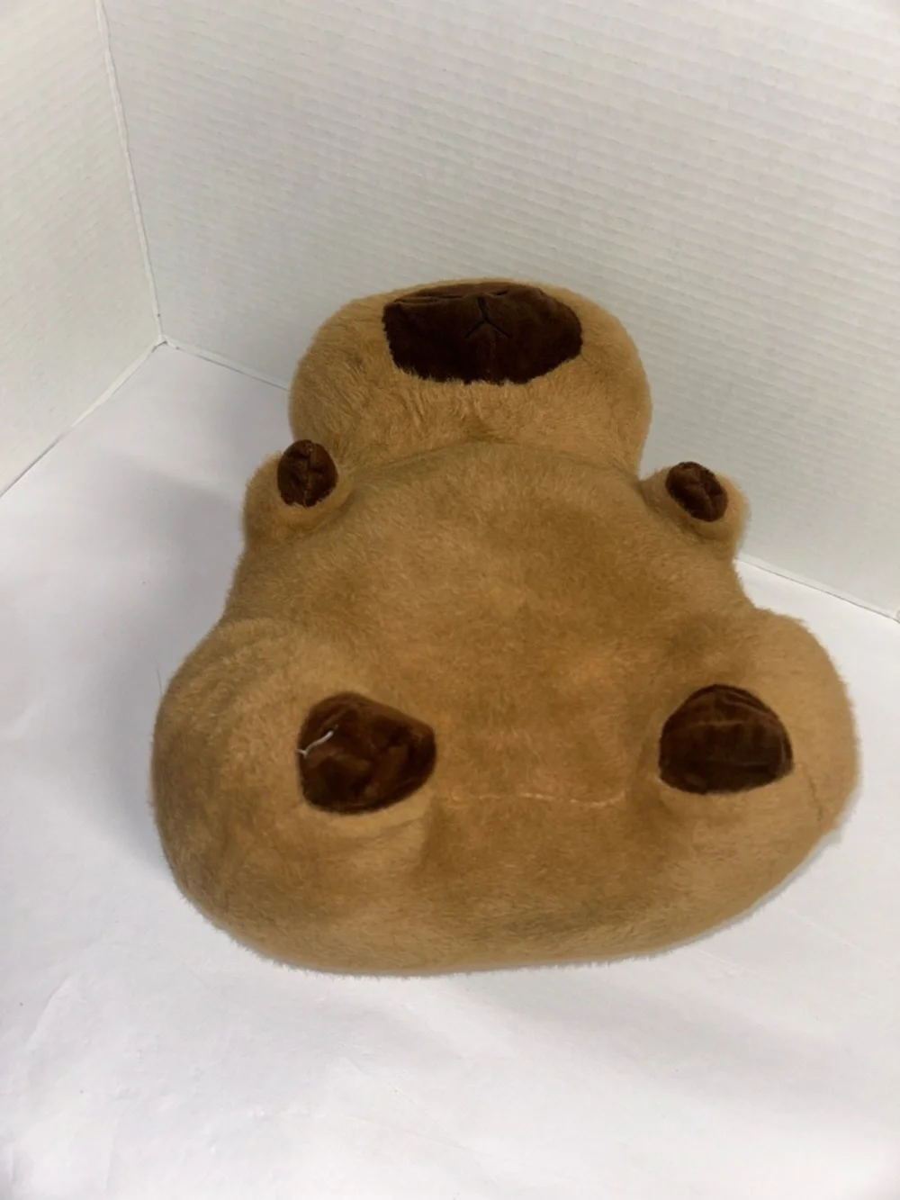 Plush Brown Capybara Pet Toy with Orange-and-White Donut Collar